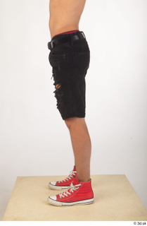 Colin black shorts clothing leg lower body red shoes 0003.jpg